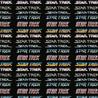 Pattern of 'Star Trek' logos in various colors on a black background